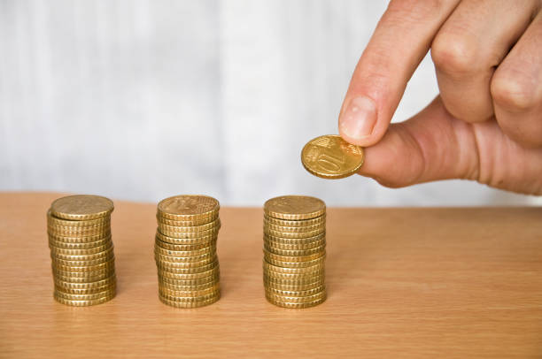 istock pile investment money with coins 829802374