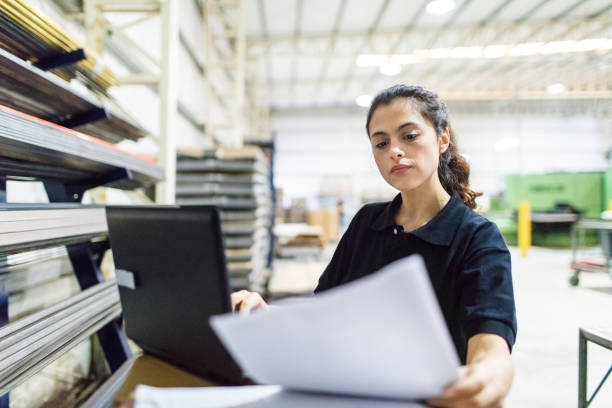 istock Female worker working in manufacturing plant 829813680
