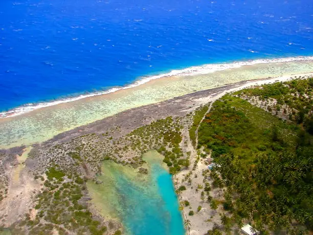 Above Polynesian Tropical Summer paradise: Sandy turquoise tropical beach, Bora Bora, Tahiti motus and reefs aerial view – Idyllic French Polynesia