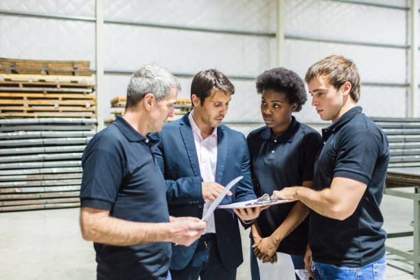 istock Manager and worker discussing in factory 829821834