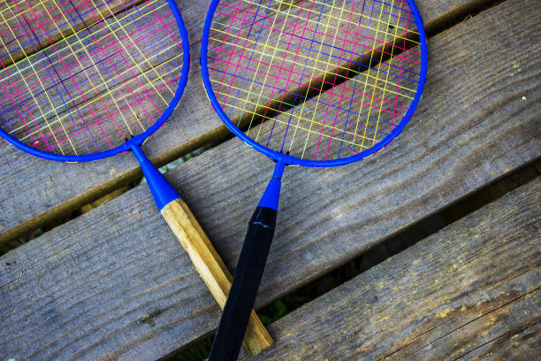 istock Racquets for badminton with short arms and colored nets. Different grips. Active sports game. 829868600
