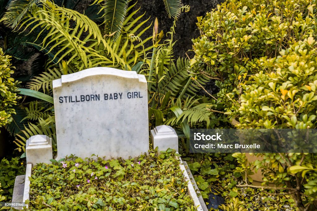 Still born baby headstone Still born baby headstone in cemetery Baby - Human Age Stock Photo