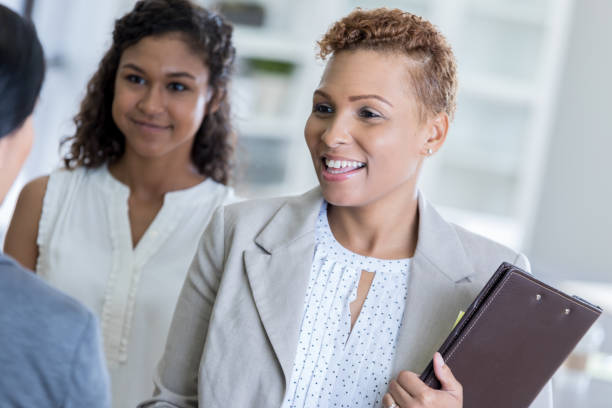 istock African American female executive meets with client 829917172