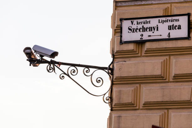 Camera at the corner of the building along Szechenyi Street in Budapest, Hungary. In the central part of the city there are many cameras for traffic control.