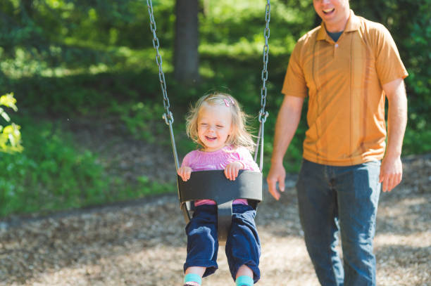 istock Girl in swing 829955438