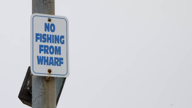 istock Fishing Sign at Wharf 830058322