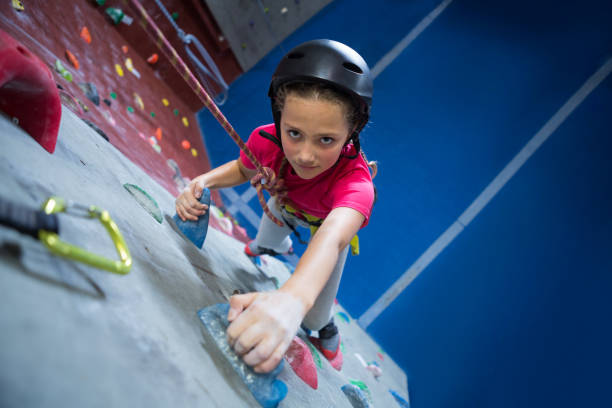 istock Teenage girl practicing rock climbing 830072032