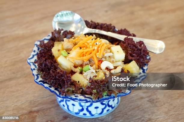 Spicy Fruit Salad Mixed With Pomelo Pineapple Cashew Nuts Green Bean Decorated With Carrot And Sesame Seeds Veganism Food Is The Practice Of Abstaining From The Use Of Animal Products Stock Photo - Download Image Now