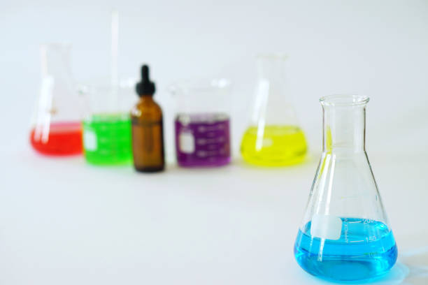 istock Group of Laboratory Glass Erlenmeyer Conical Flask and Beaker filled with chemical liquid for a chemistry experiment. 830085334