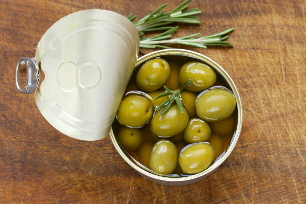 Organic canned green olives with fresh  rosemary