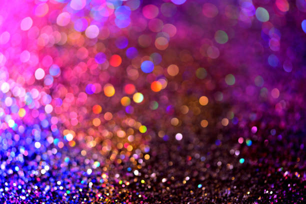 istock golden glitter texture Colorfull Blurred abstract background for birthday, anniversary, wedding, new year eve or Christmas 830151674