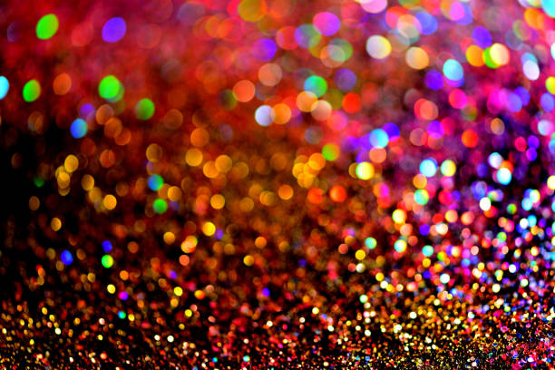 istock golden glitter texture Colorfull Blurred abstract background for birthday, anniversary, wedding, new year eve or Christmas 830152276