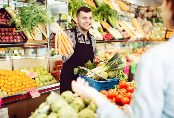 istock Male seller assisting in buying 830193338