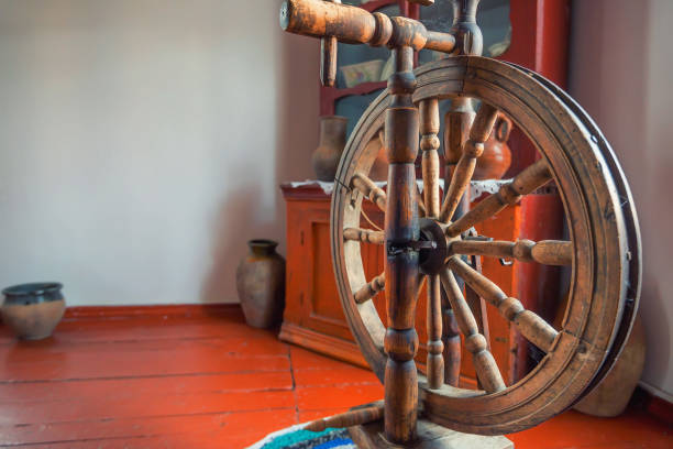 istock Old wooden spinning wheel 830214102
