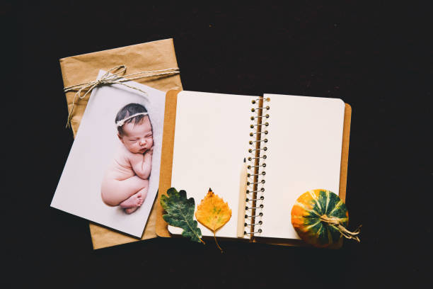 istock Printed card with sleeping newborn baby 830229218