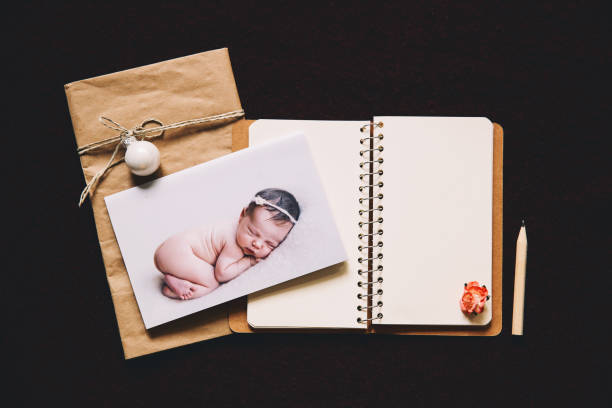 istock Printed card with sleeping newborn baby 830230130