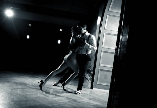 Argentinian Tango Dance Beautiful dancers performing an Argentinian tango dance. tango dance stock pictures, royalty-free photos & images