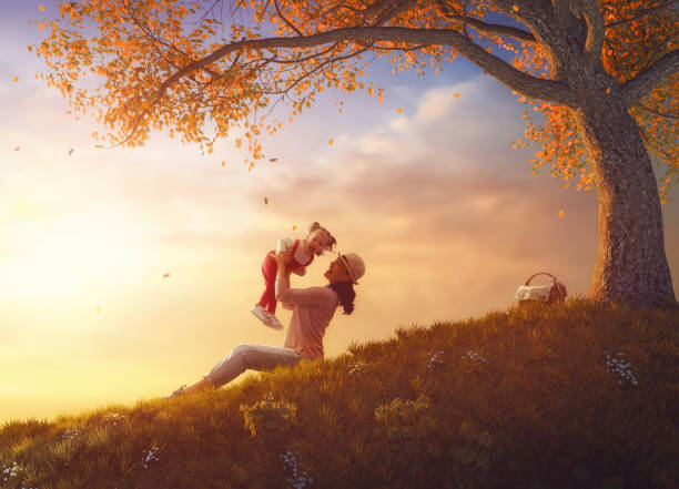 istock Mother and child playing outdoors 830231784