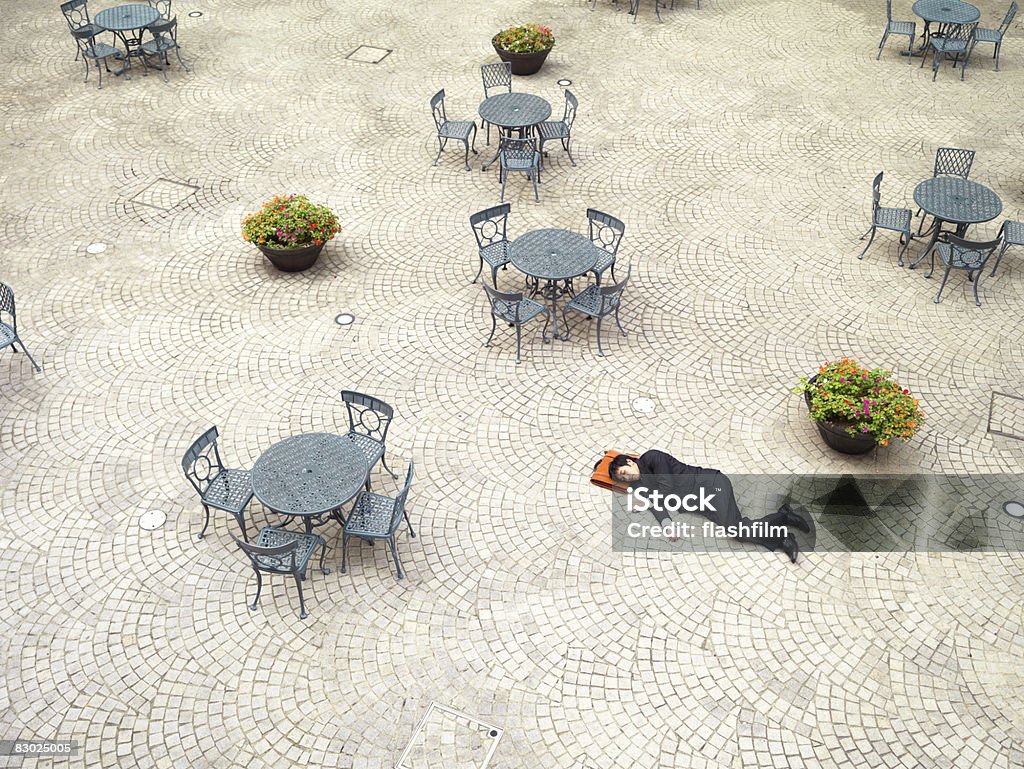 Japanese bussinessman sleeping outside  Sleeping Stock Photo