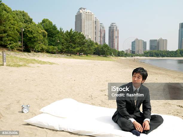 Japanese Bussiness Man Sitting On Futon At Beach Stock Photo - Download Image Now - Beach, Bizarre, Boredom
