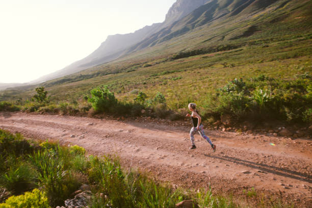 istock Fit female getting out in nature for a run 830253540