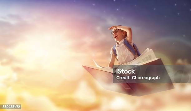 Child Flying On The Book Stock Photo - Download Image Now - Child, Book, Adventure