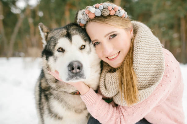 istock Happy woman owner and dog 830270512