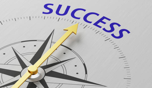 istock Compass needle pointing to the word Success 830277266