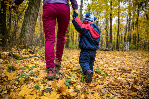 istock Mother and child in the park 830292168