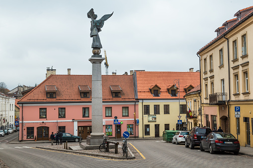 Vilnius, Lithuania - March, 11, 2017:  Streetview with Angel of Uzupis (Uzupio) in Vilnius, Lithuania.