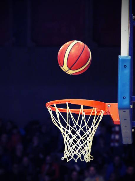 istock great shooting and basketball going into the basket 830322592