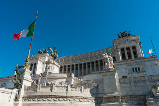 istock Monumento a Vittorio Emanuele II with italy flags 830331732