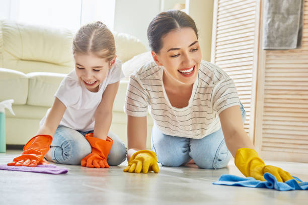 istock family cleans the room 830350772