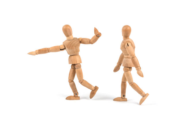 istock come and look at this! Wooden mannequin shows something 830364726
