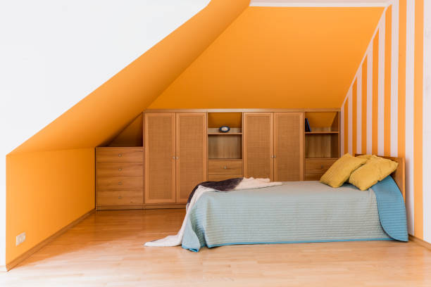 istock Modest bedroom at the attic 830370284