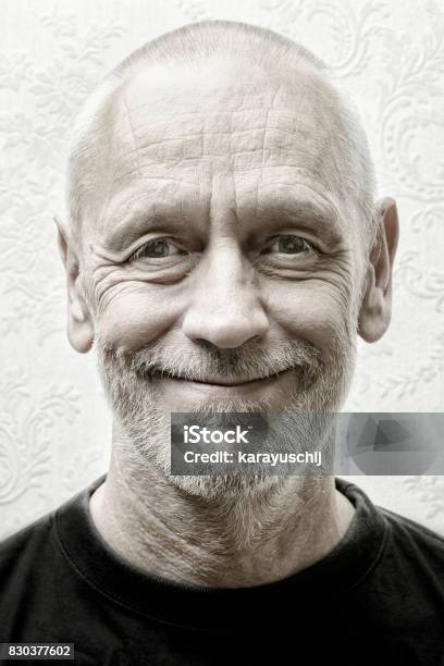 Portrait Of A Smiling Man Stock Photo - Download Image Now - Black And  White, Portrait, Senior Men - iStock