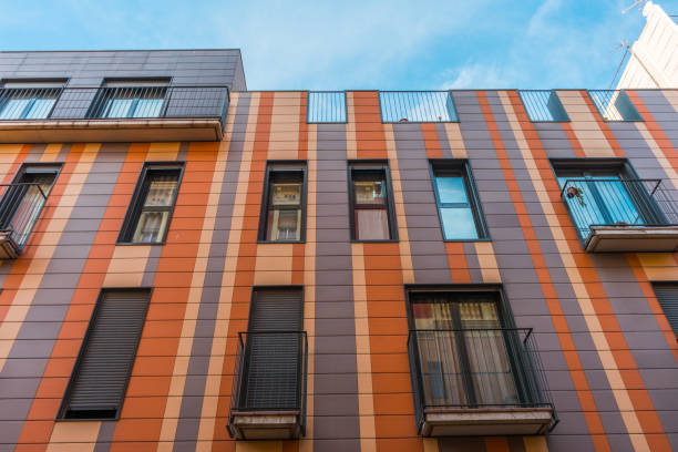 istock modern architecture with red, orange and pink facade 830384116