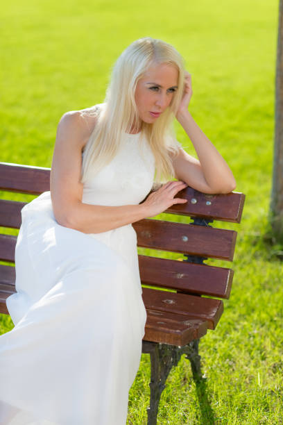 istock Girl chills in the park 830388562