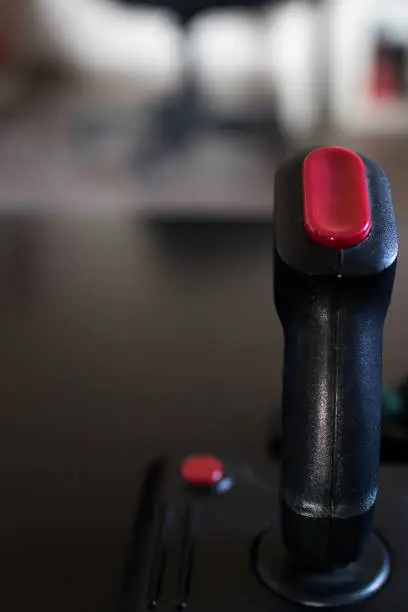 Joystick arcade game for computer and console from 80's. Black color with red buttons