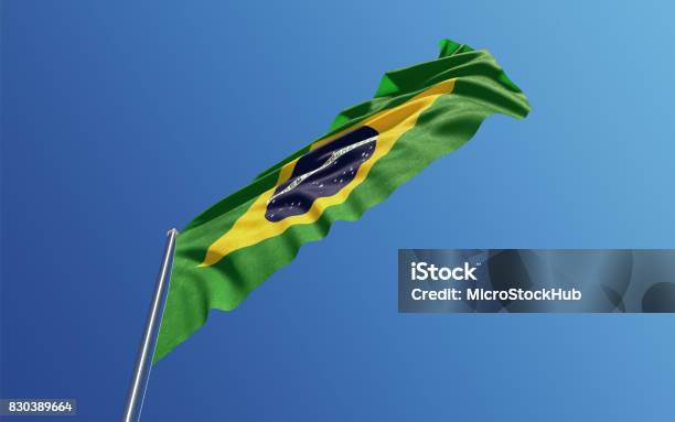 Brazilian Flag Waving With Wind On Blue Sky Stock Photo - Download Image Now - Brazil, Flag, Blue