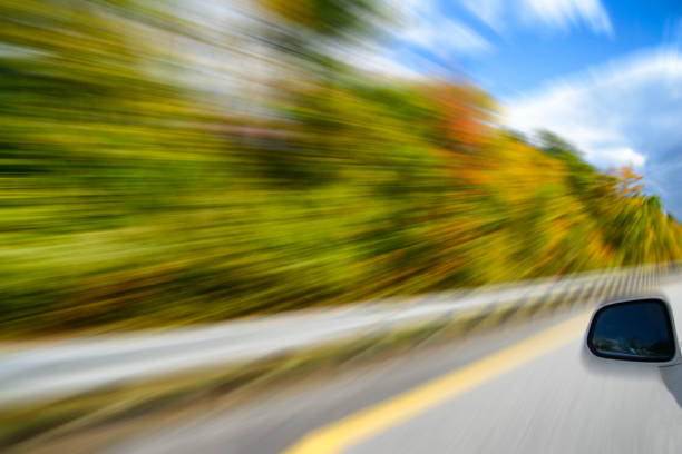 istock Driving in foliage autumn in New England 830399530