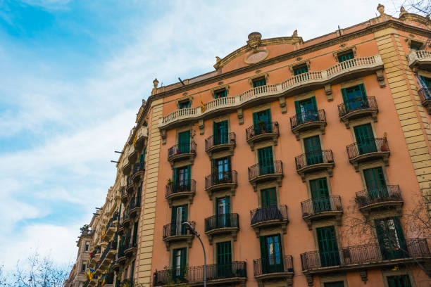 istock historical apartment building with orange facade and small balconies 830401034