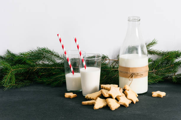 istock Cookies and milk Christmas themed on the table 830404842