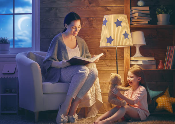 istock Family reading bedtime. 830435462