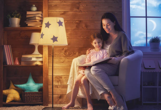 istock Family reading bedtime. 830435668