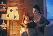 Family reading bedtime.