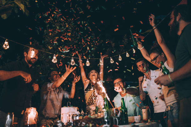 istock Group of friends enjoying the backyard party 830451314