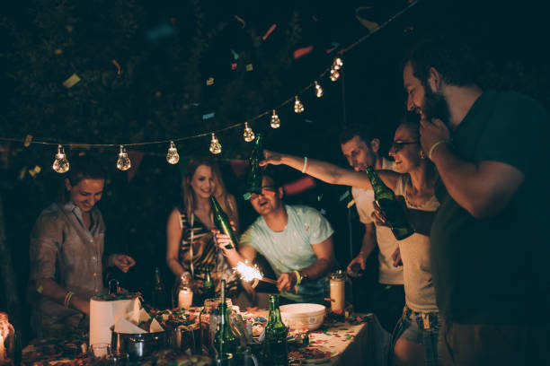 istock Friends enjoying the backyard party 830452164