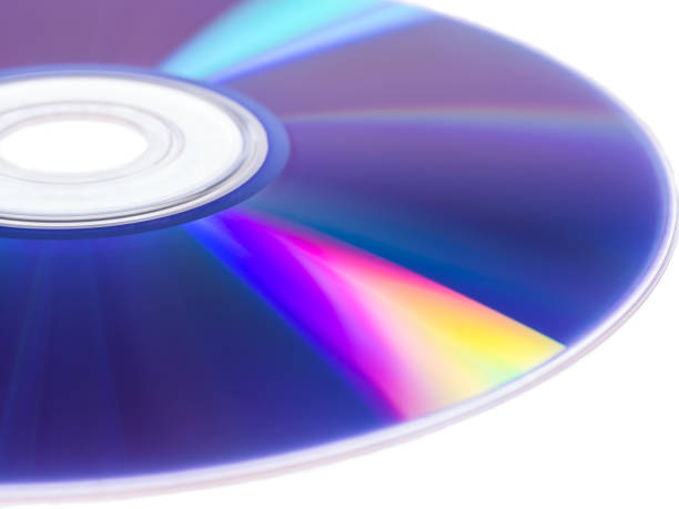 istock CDs with colorful reflections on white isolated background 830475078