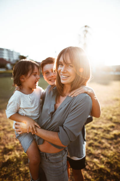 istock happy family have fun in the park 830511666